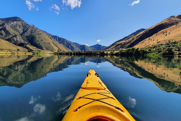 Paddle through serene waters surrounded by stunning mountains discovering the untouched beauty of Moke Lake. A perfect escape from Queenstown's hustle ideal for nature lovers and adventurers alike.